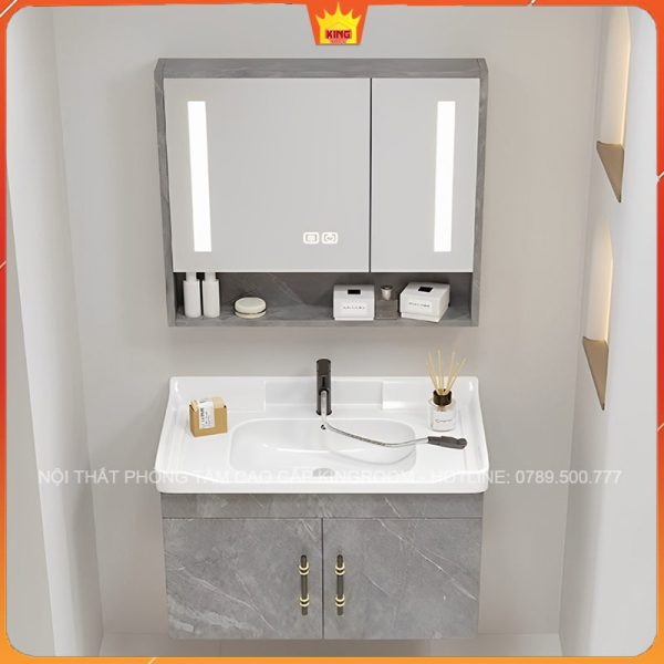 Thiết kế nội thất phòng tắm hiện đại với tủ lavabo và gương có đèn, không gian sang trọng và tiện nghi