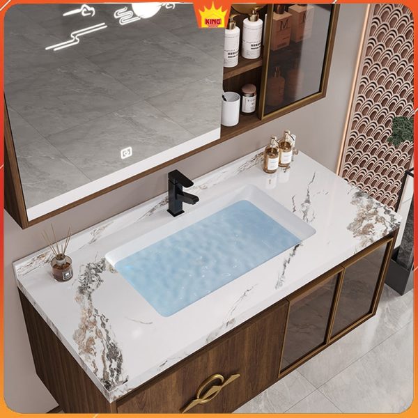 Tủ lavabo cao cấp với mặt đá hoa cương, chậu âm hiện đại và gương cảm ứng, phù hợp cho phòng tắm sang trọng