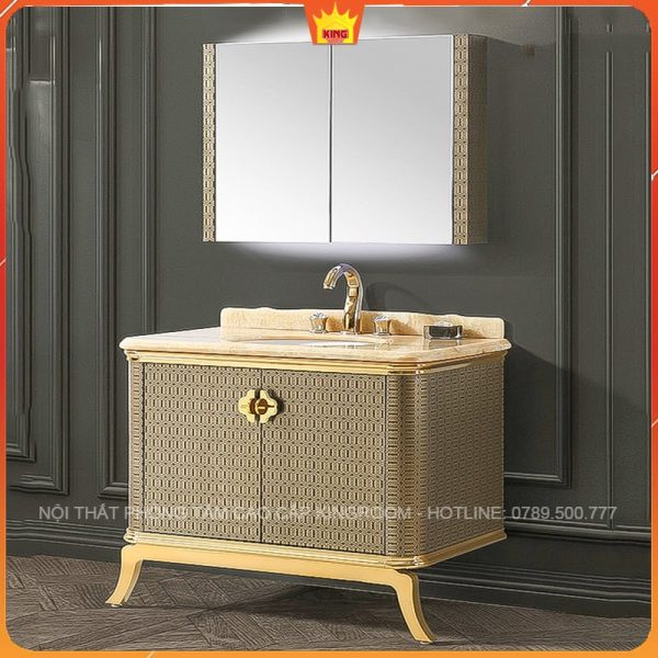 Tủ Lavabo Inox 304 LX40 được đặt trong không gian phòng tắm tối màu, làm nổi bật khung mạ vàng và mặt đá cẩm thạch