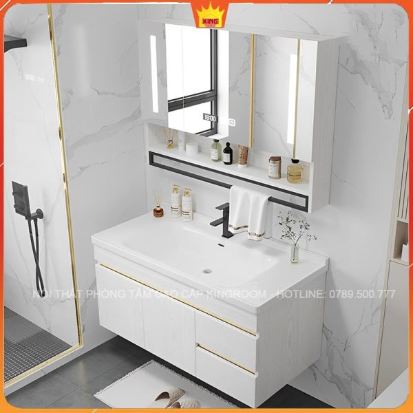 Nội thất phòng tắm với tủ lavabo inox và gương đèn LED, không gian sang trọng và tiện nghi.