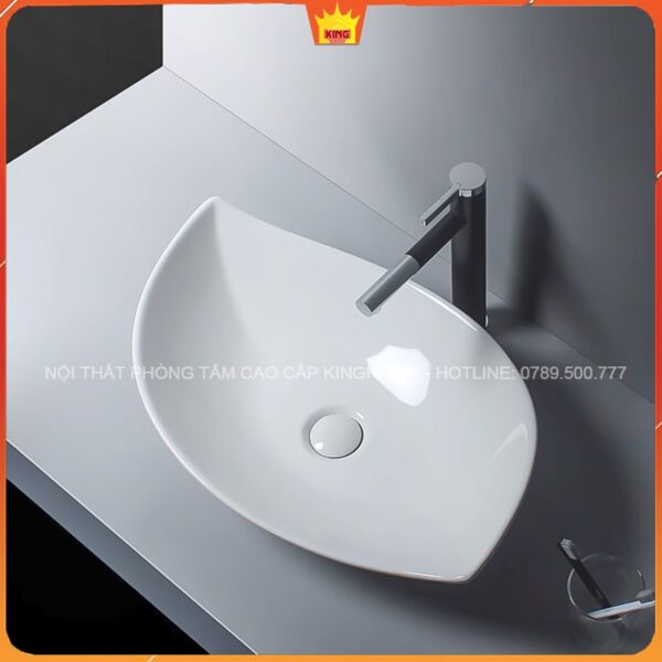 Lavabo đặt bàn Aqua AM10 trên mặt bàn phòng tắm hiện đại với vòi nước sang trọng